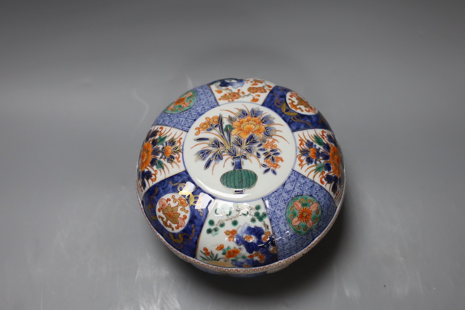 A Japanese Imari box and cover, by Fukugawa, a.f. 19cm diameter